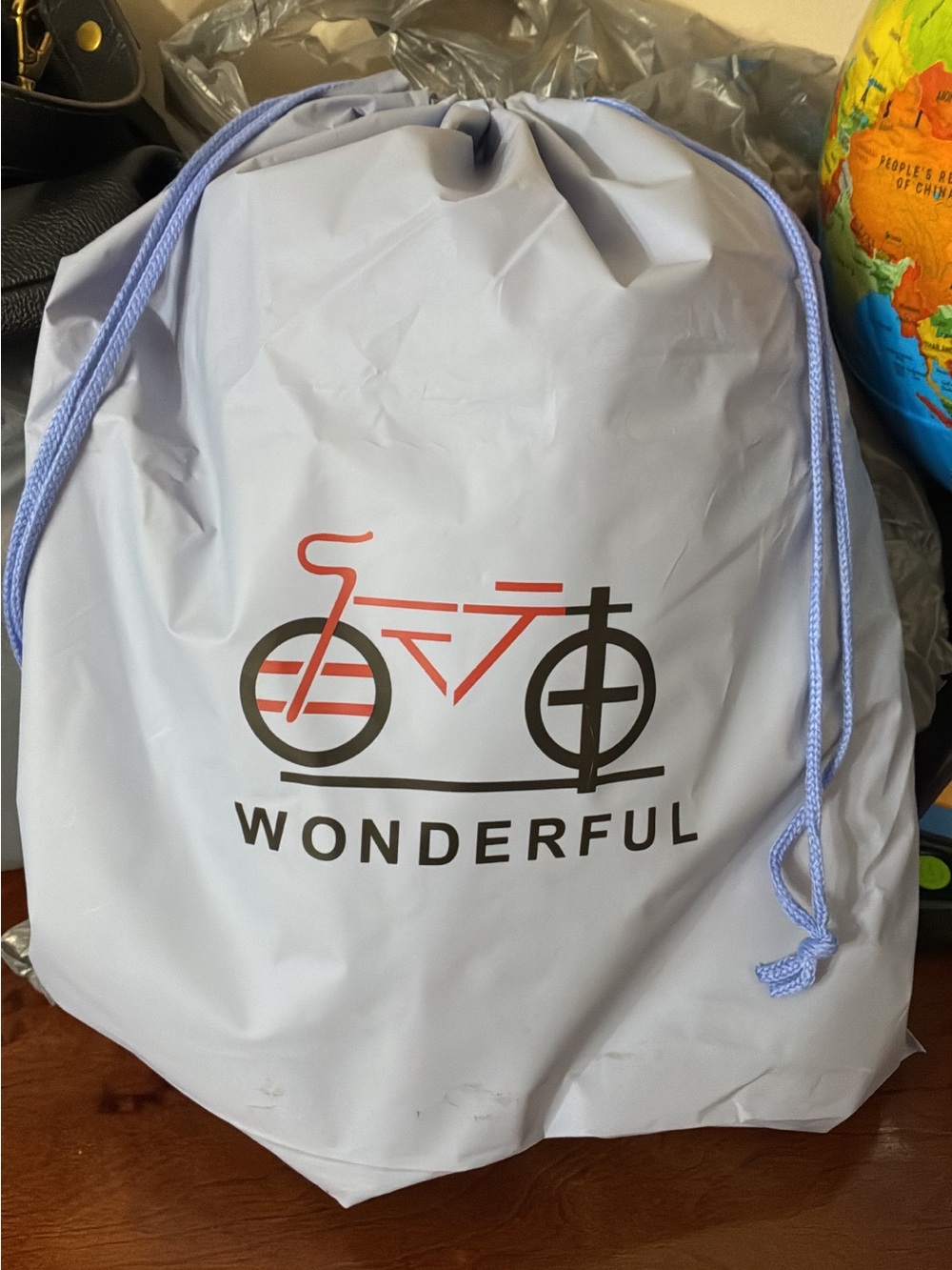 Wonderful Bike Logo Drawstring Backpack in Light Lavender